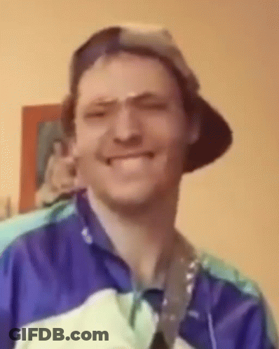 Man In Hat With Medal Smiling Funny Face GIF