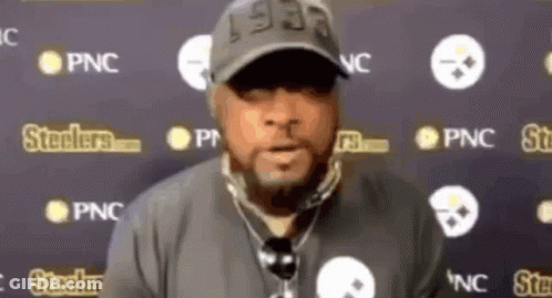 Man In Hat With Microphone In Front Of Steelers Logos GIF