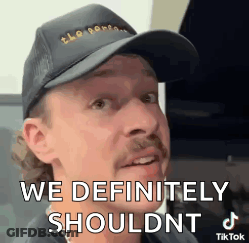 Man In Hat With Mustache Saying We Definitely Shouldn't GIF