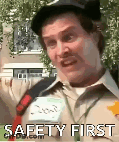 Man In Hat With Name Tag Saying Safety First GIF
