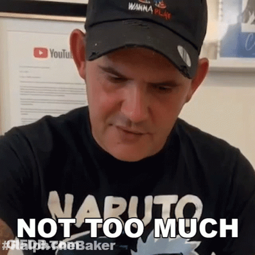 Man In Hat With Shirt Saying Not Too Much GIF