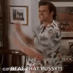 Man In Hawaiian Shirt Dancing While Holding Picture GIF