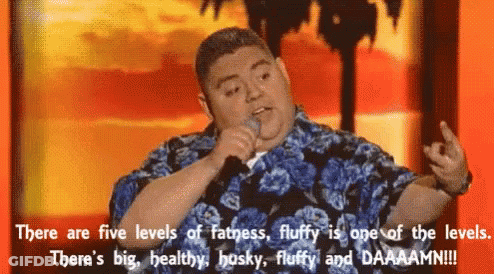 Man In Hawaiian Shirt Giving Middle Finger Holding Microphone GIF