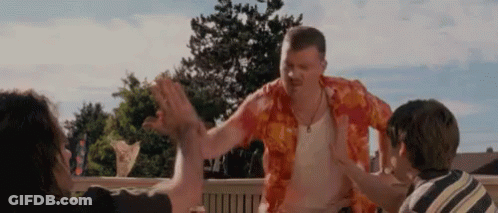 Man In Hawaiian Shirt High-Fiving Group GIF