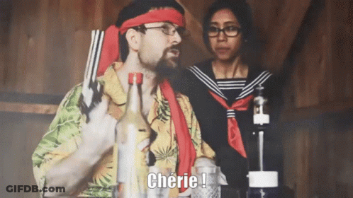 Man In Hawaiian Shirt Holding Gun Says Cherie GIF