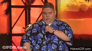 Man In Hawaiian Shirt Holding Microphone Saying Damn GIF