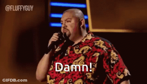 Man In Hawaiian Shirt Holding Microphone Saying Damn GIF