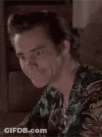 Man In Hawaiian Shirt Making Funny Face On Couch GIF