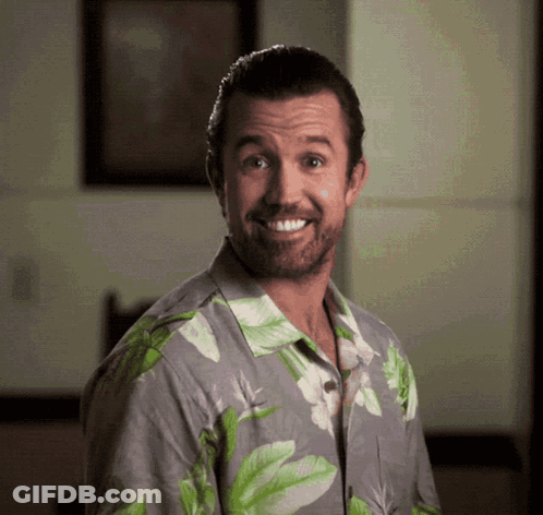 Man In Hawaiian Shirt Smiling At Camera GIF