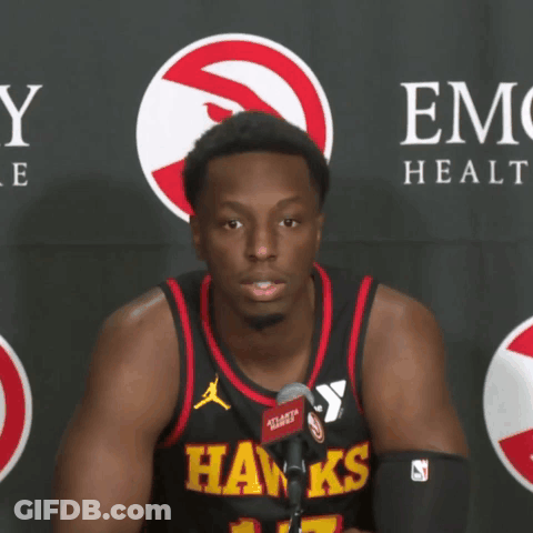 Man In Hawks Jersey At Microphone GIF
