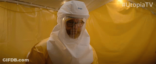 Man In Hazmat Suit And Gloves Utopiatv GIF