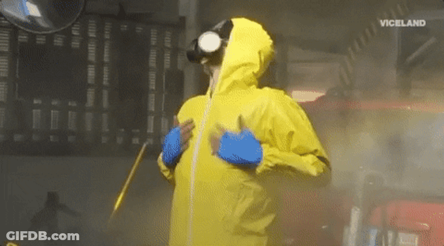 Man In Hazmat Suit Getting Disinfected GIF