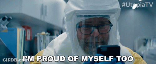 Man In Hazmat Suit Looking At Phone Says I'm Proud Of Myself Too GIF