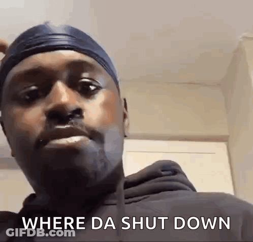 Man In Headband And Black Hoodie Says Where Da Shut Down GIF