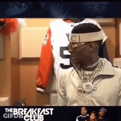Man In Headband And Glasses At Microphone GIF