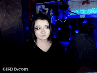 Man In Headband And Glasses Talking Into Microphone GIF