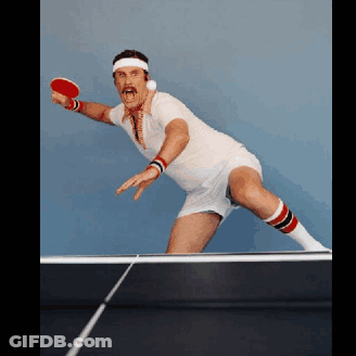 Man In Headband And Socks Playing Ping Pong GIF