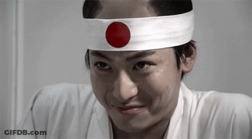 Man In Headband With Red Circle GIF