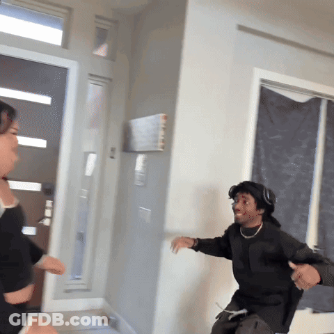 Man In Headphones And Adidas Sweatshirt GIF