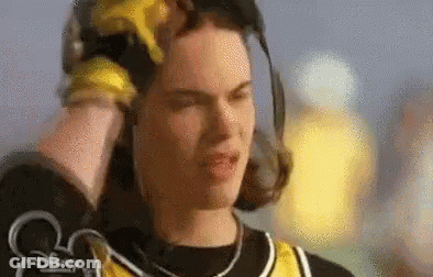 Man In Headphones And Baseball Cap Scratching Head GIF