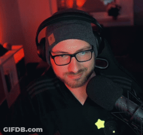 Man In Headphones And Beanie Thumbs Up GIF