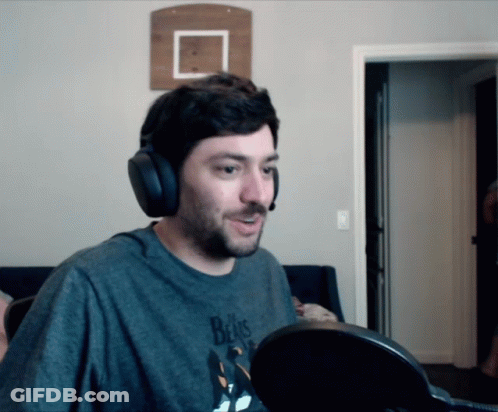 Man In Headphones And Beatles T-Shirt GIF