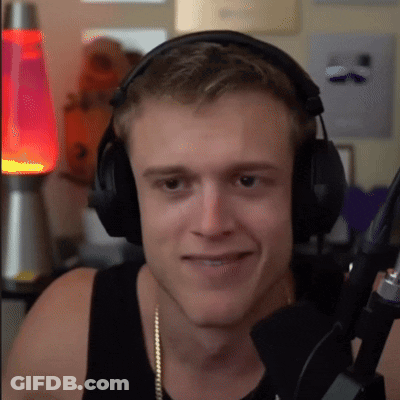 Man In Headphones And Black Tank Top Smiling GIF