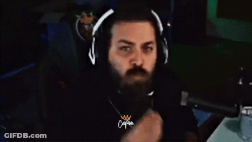 Man In Headphones And Blood Shirt Giving Middle Finger GIF