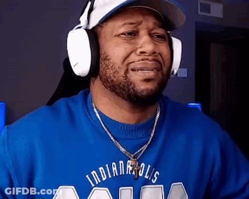 Man In Headphones And Blue Indianapolis Shirt GIF