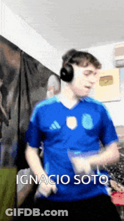 Man In Headphones And Blue Shirt Ignacio Soto GIF