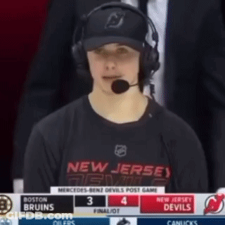 Man In Headphones And Devils Jersey GIF