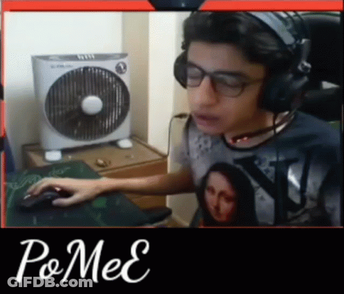 Man In Headphones And Glasses Playing Video Game With Mouse GIF