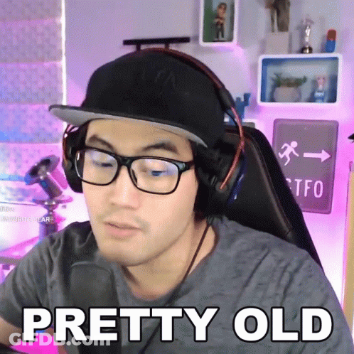 Man In Headphones And Glasses Saying Pretty Old GIF