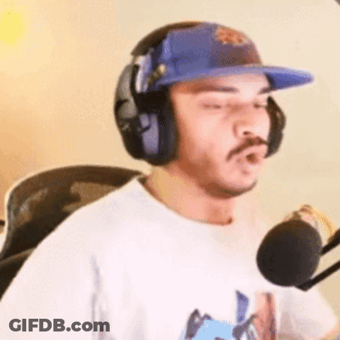 Man In Headphones And Hat At Microphone GIF