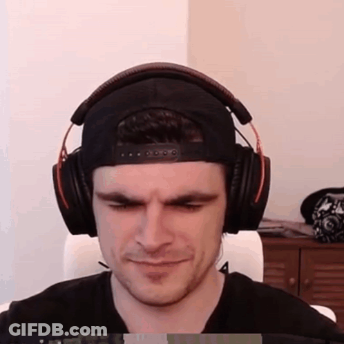 Man In Headphones And Hat Making Face GIF