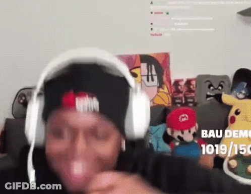 Man In Headphones And Hat On Couch Saying Bau Demo GIF