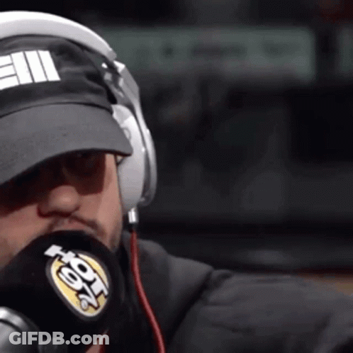 Man In Headphones And Hat Saying E11 Into Microphone GIF