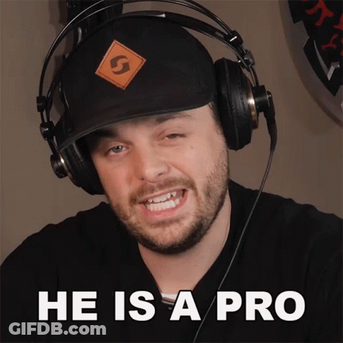Man In Headphones And Hat Saying He Is A Pro GIF