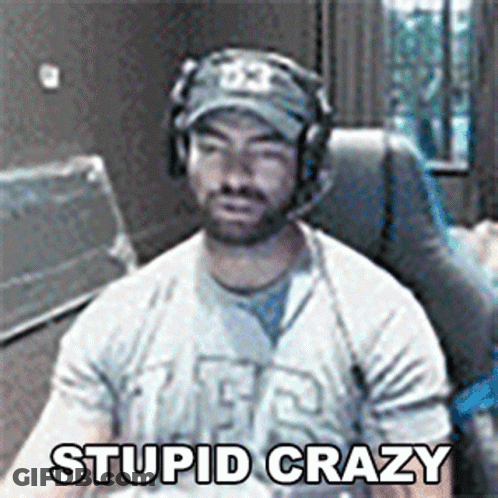 Man In Headphones And Hat Saying Stupid Crazy GIF