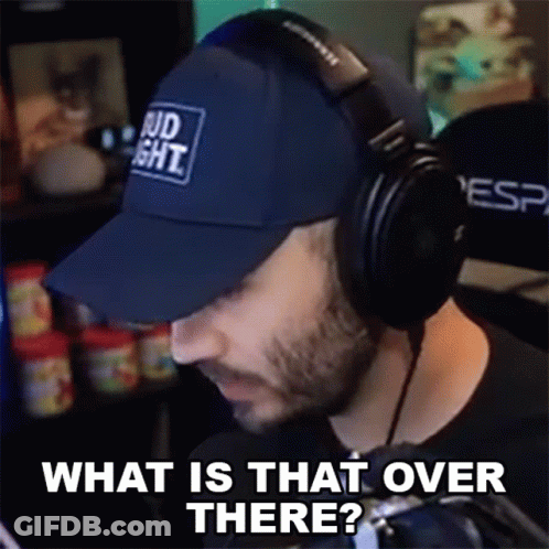 Man In Headphones And Hat Saying What Is That Over There GIF