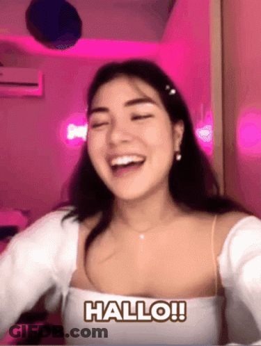 Man In Headphones And Hat Singing Into Microphone GIF