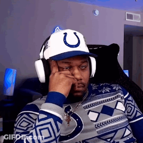 Man In Headphones And Hat With Horseshoe GIF