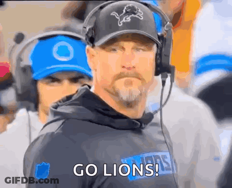 Man In Headphones And Hat With Lion Says Go Lions GIF