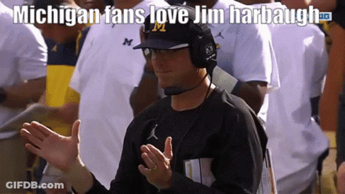 Man In Headphones And Hat With M Says Michigan Fans Love Jim Harbaugh GIF