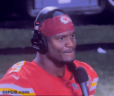Man In Headphones And K Headband Talking Into Mic GIF