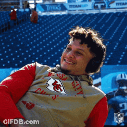 Man In Headphones And Kansas City Chiefs Shirt At Stadium GIF