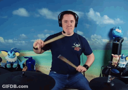 Man In Headphones And Number 10 Shirt Playing Drums GIF