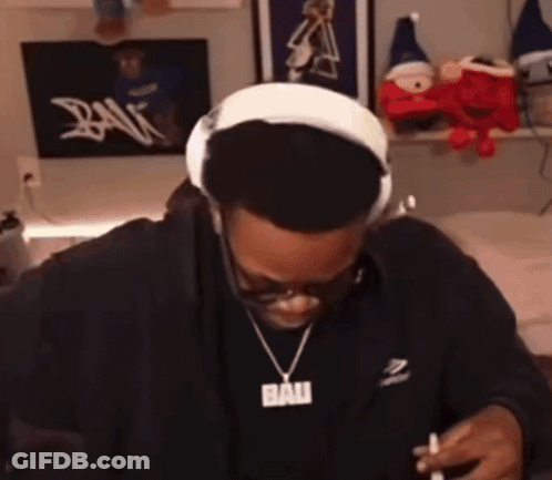 Man In Headphones And Pendant Saying Ban GIF
