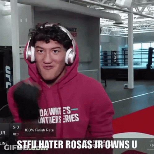Man In Headphones And Pink Hoodie Saying Dawn's Unanswerable Series GIF