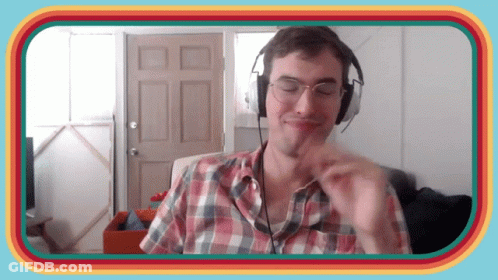 Man In Headphones And Plaid Shirt Making Face GIF